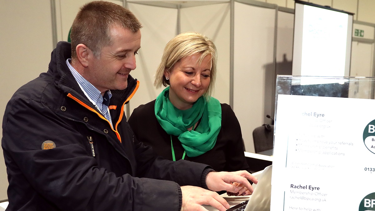Rachel helping a member at PestEx 2017 Rachel helping a member at PestEx 2017